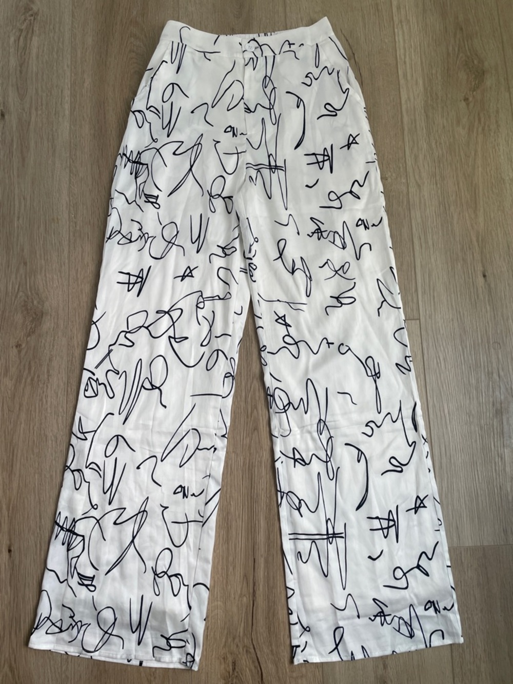 12th Tribe White Wide Leg Pants with Black Script Print